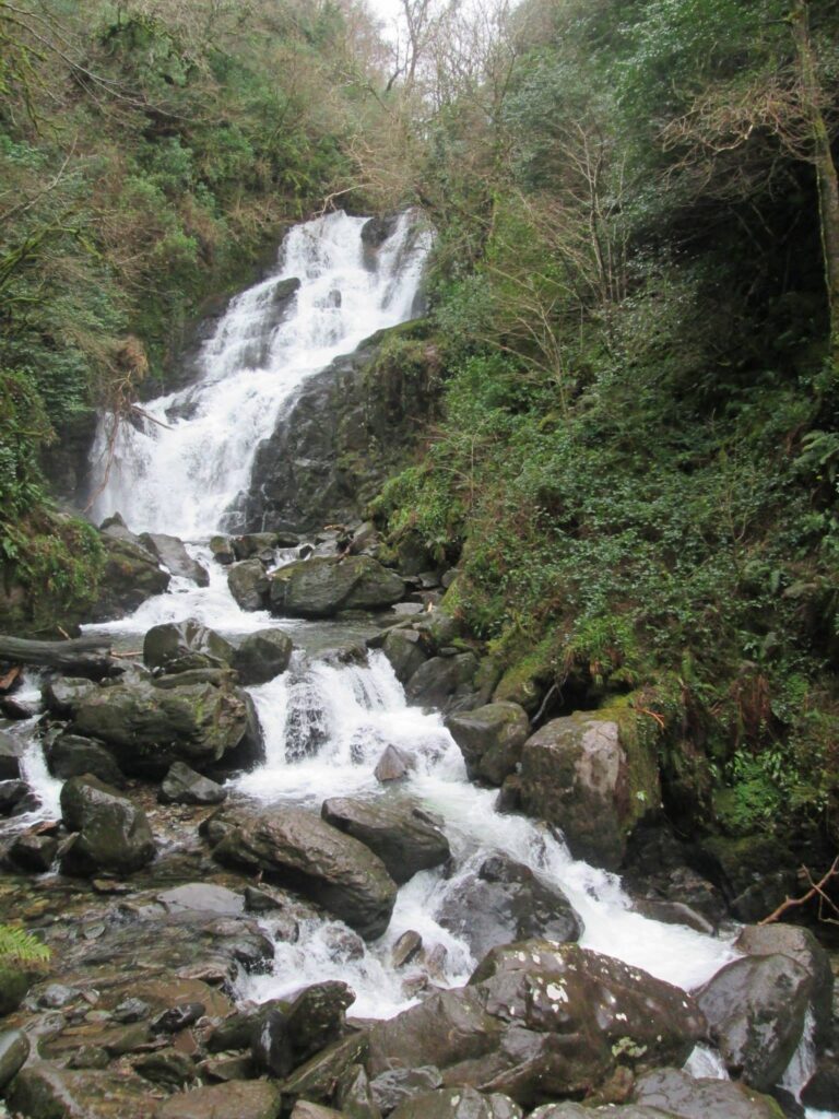 A waterfall cascading down rocks.